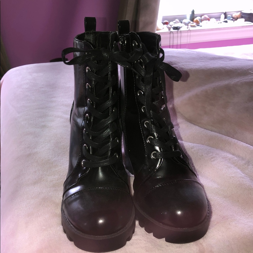 Shiny, heeled combat boots
